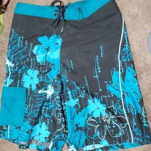 Nike teal blue and black lined board shorts